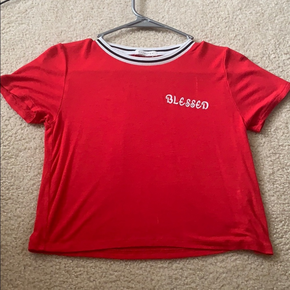 lightly cropped red t-shirt